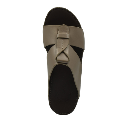 Top view of taupe luxury leather sandals with a loop detail and black footbed