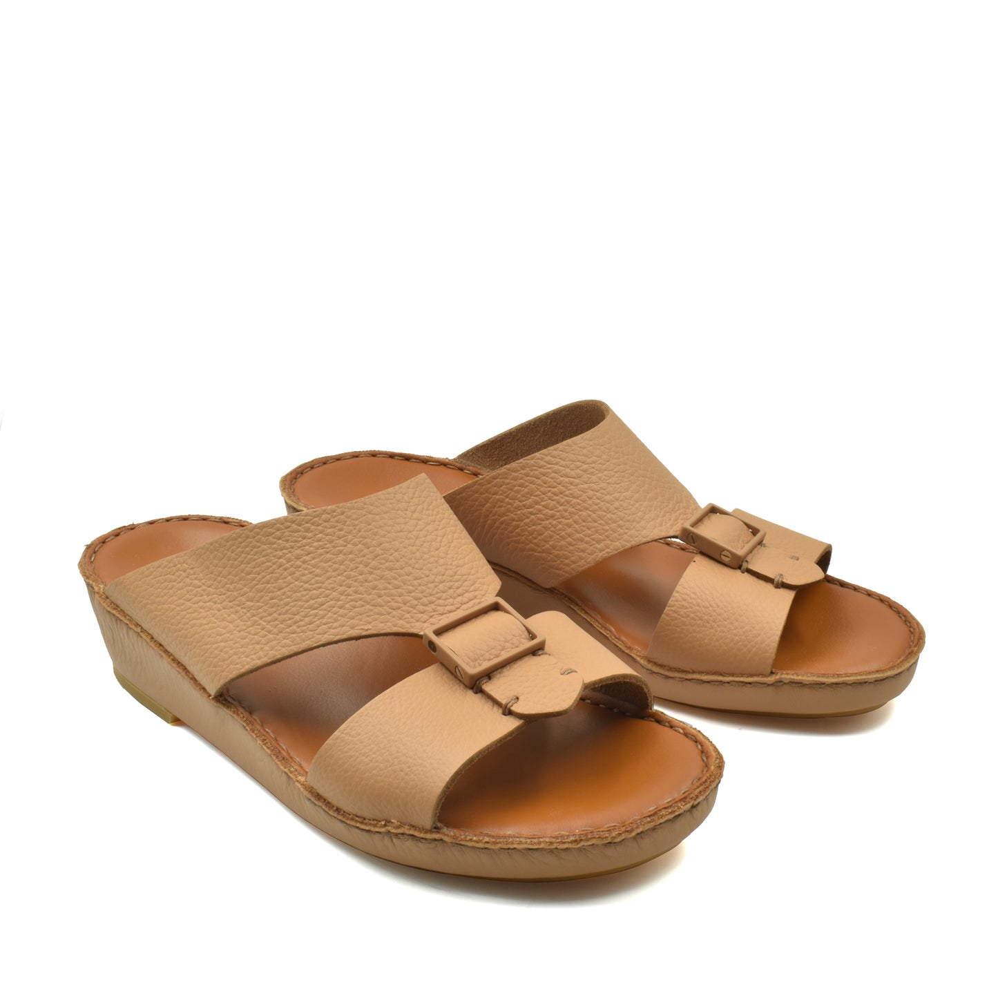 Pair of beige luxury leather sandals with adjustable straps and cushioned sole from Private Collection