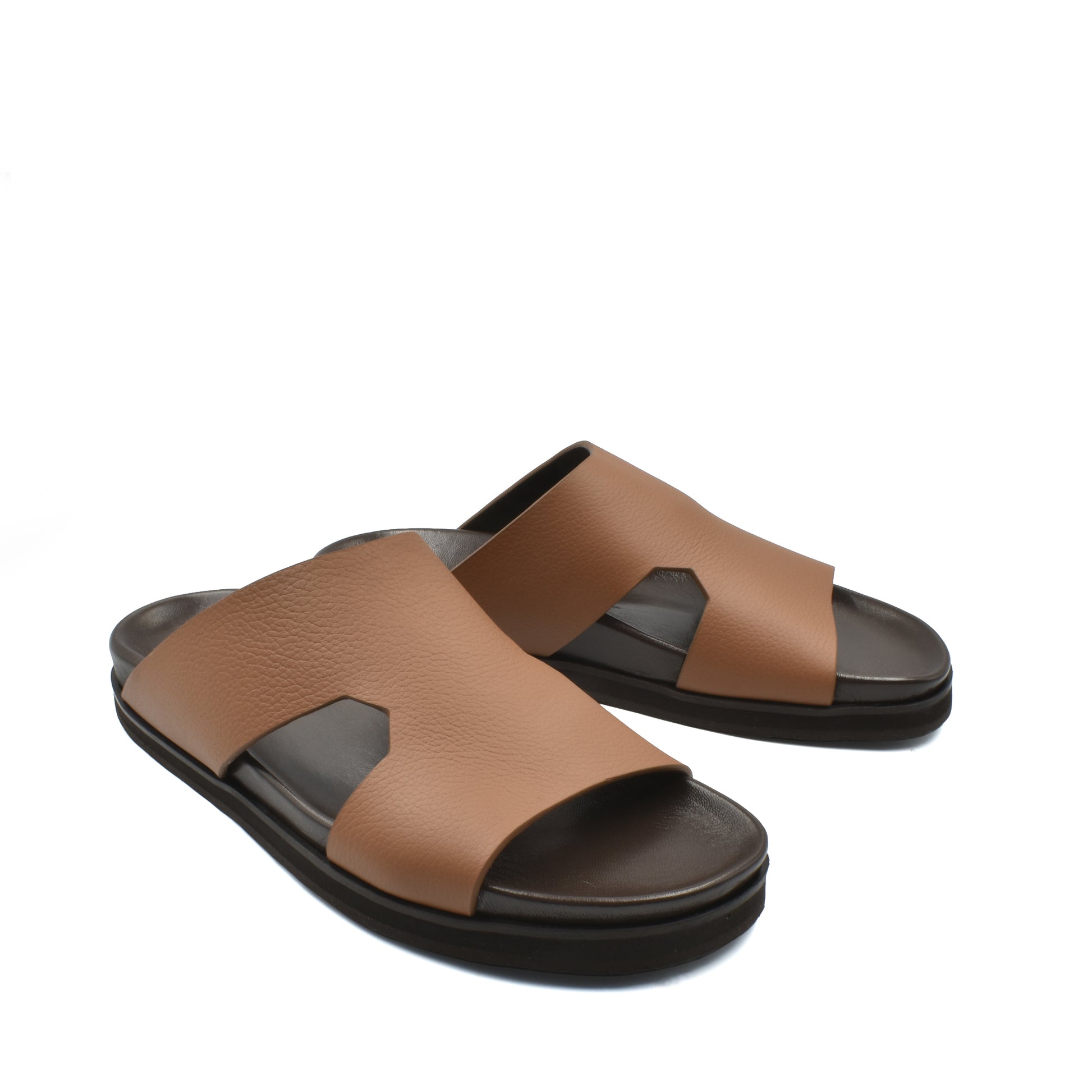 Brown luxury leather sandals with black soles featuring wide straps and open toes