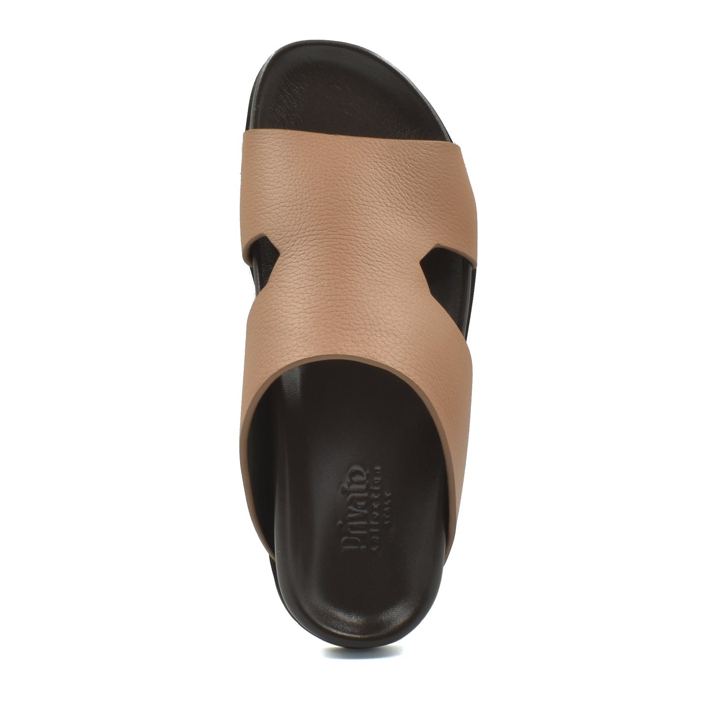 Top view of tan and black luxury leather sandals with cushioned footbed from Private Collection
