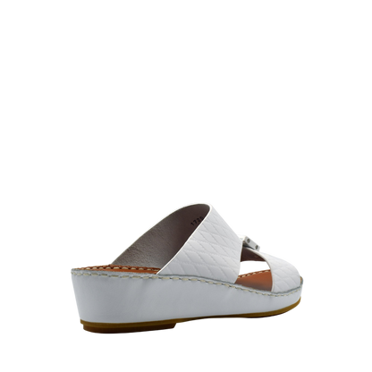 White luxury leather sandals with quilted straps and wedge sole from Private Collection