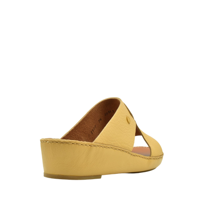 Yellow luxury leather sandals with wedge heel and open toe design for comfortable style
