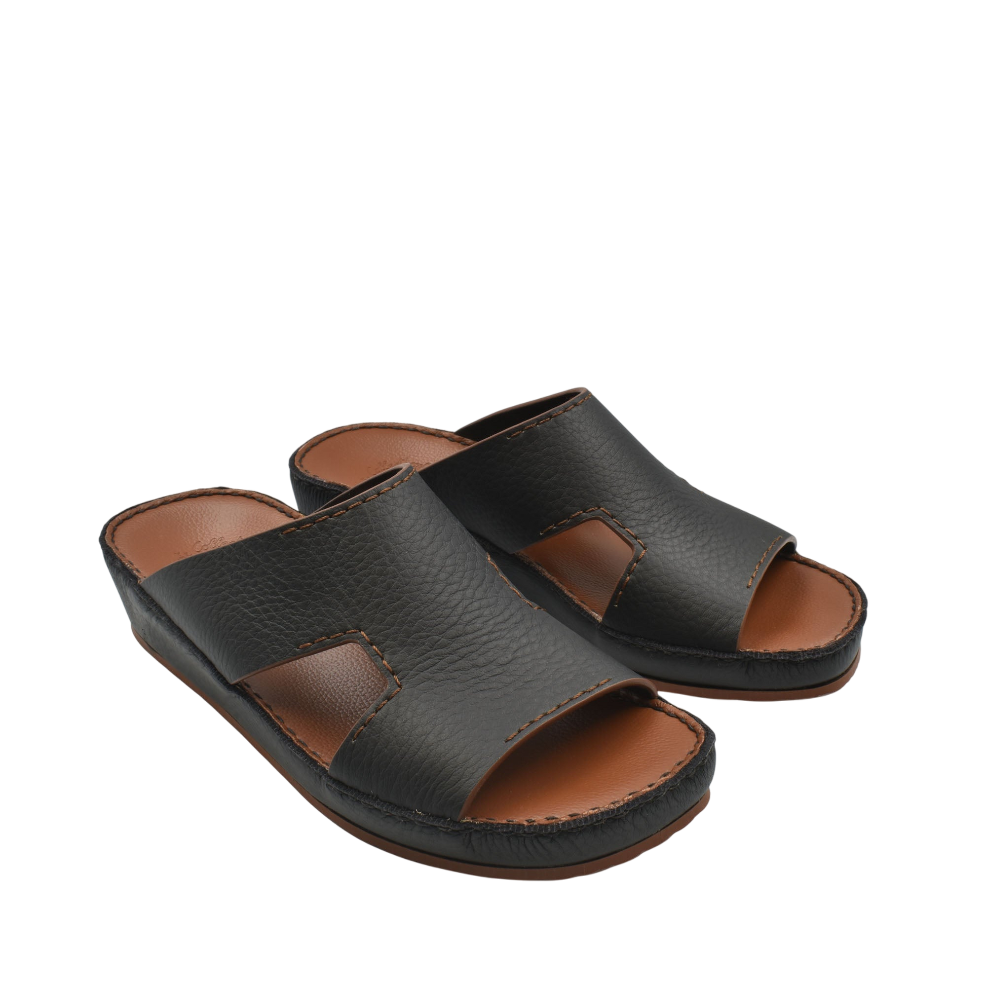 Black luxury leather slide sandals with open toe and cushioned brown footbed