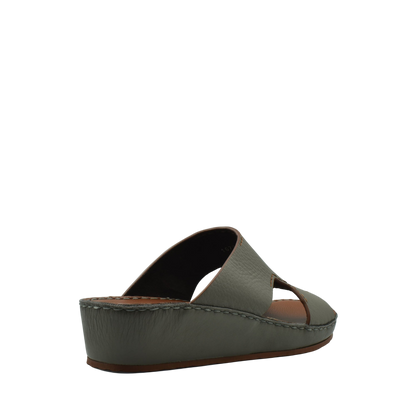 Gray luxury leather slide sandals with cushioned wedge sole from Private Collection