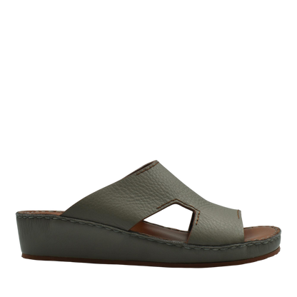 Gray luxury leather slide sandals with open toe and cushioned wedge sole for comfort