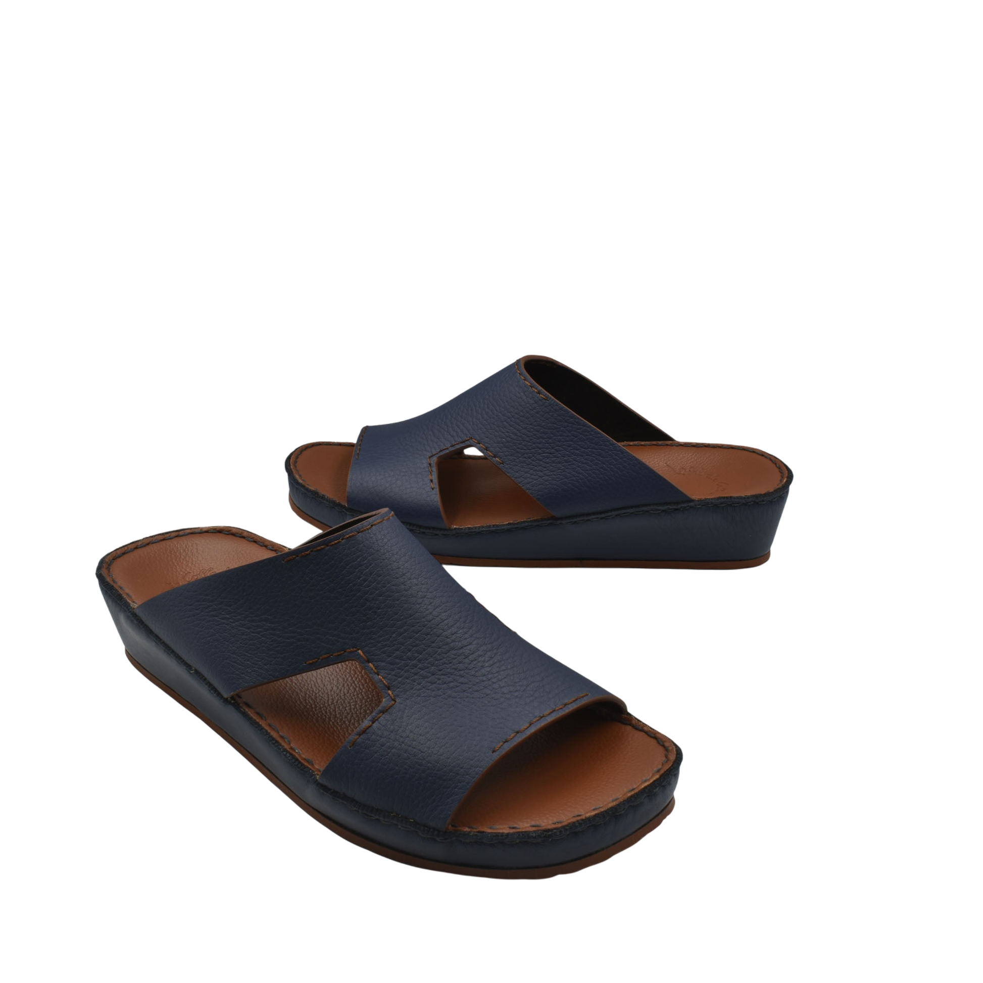 Pair of navy blue luxury leather slide sandals with cushioned sole and open toe design