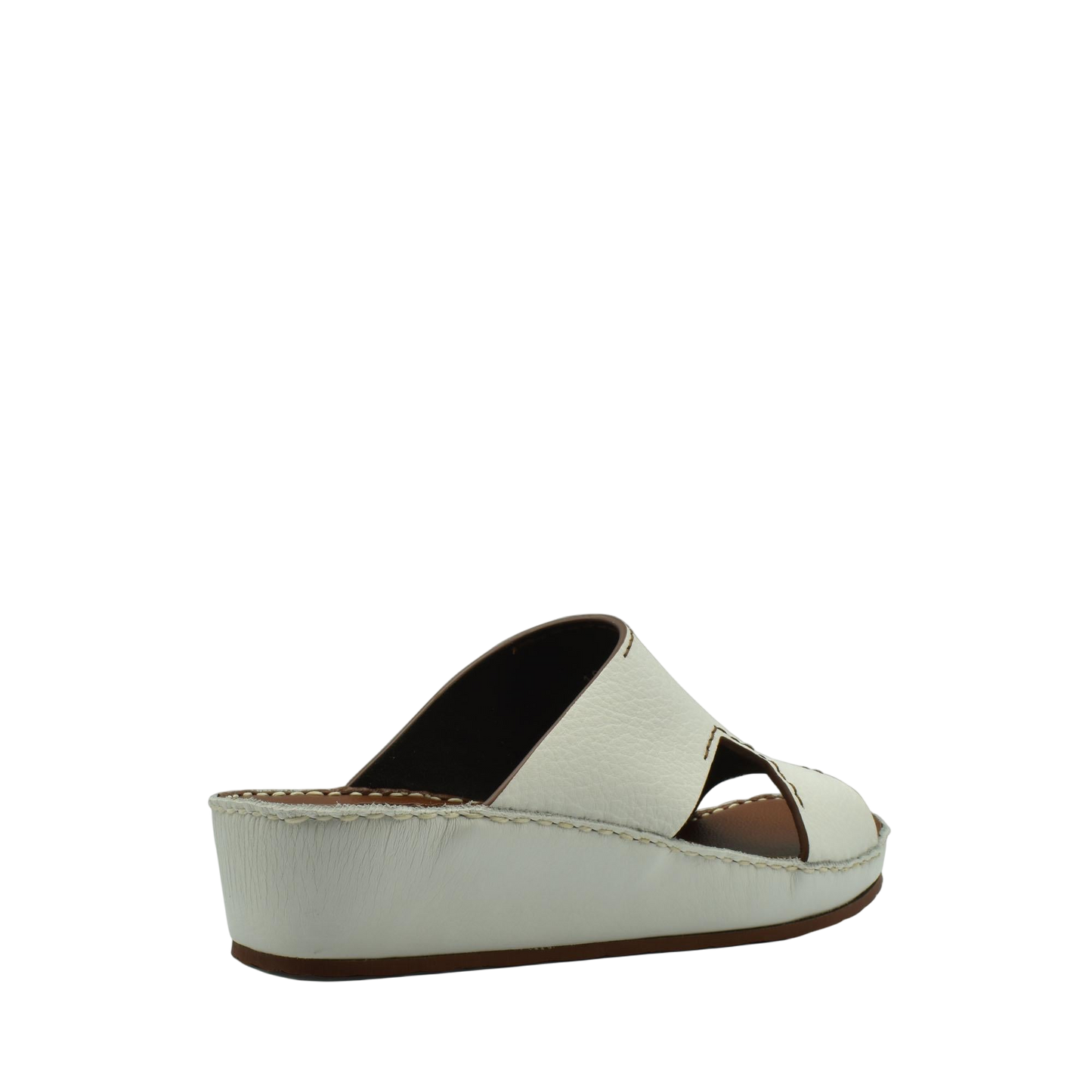 White luxury leather slide sandals with open toe and cushioned wedge sole