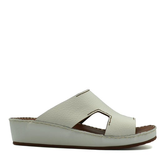 White luxury leather slide sandals with open toe and stitched detailing from private collection