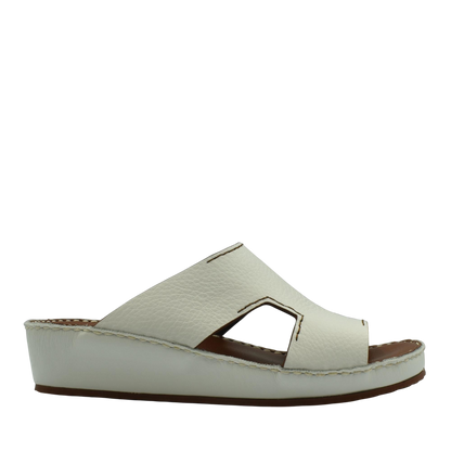 White luxury leather slide sandals with open toe and stitched detailing from private collection