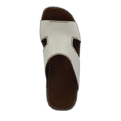 Luxury leather slide sandals with white textured upper and brown cushioned sole