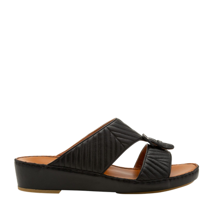 Black luxury matelasse footwear slide sandal with quilted straps and low wedge heel