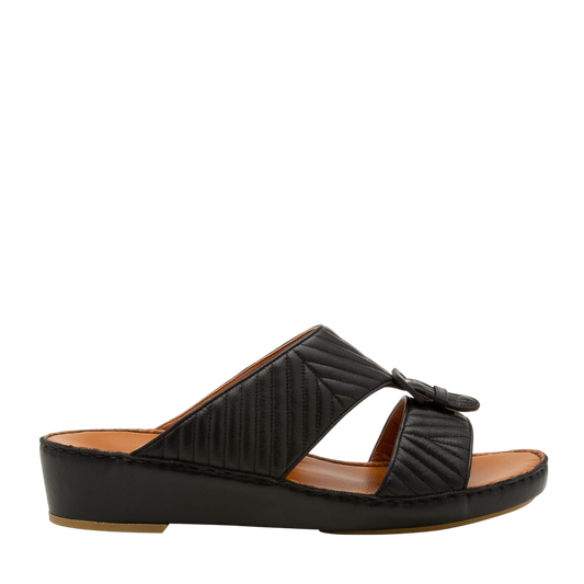 Black luxury matelasse footwear slide sandal with quilted straps and low wedge heel
