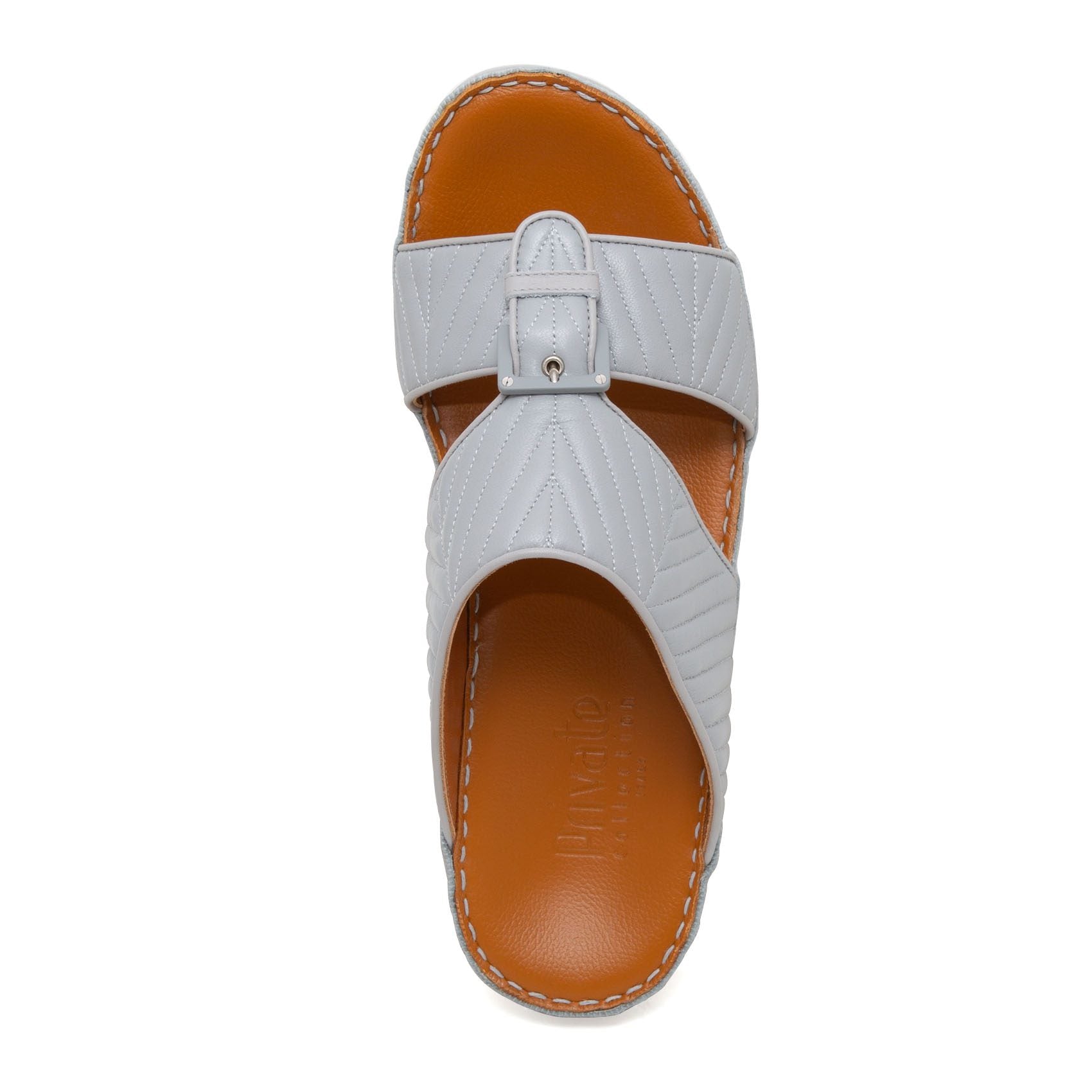 White luxury matelasse footwear slide sandal with stitched brown sole from Private collection