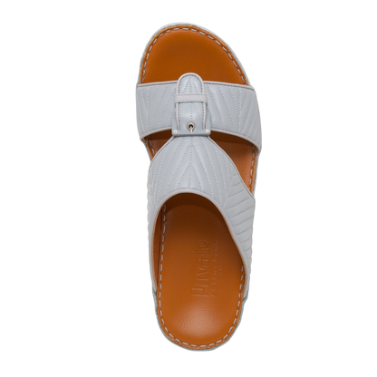 White luxury matelasse footwear slide sandal with stitched brown sole from Private collection