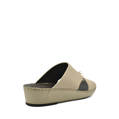Beige luxury nappa leather sandal with wedge sole and open toe design from Private Collection