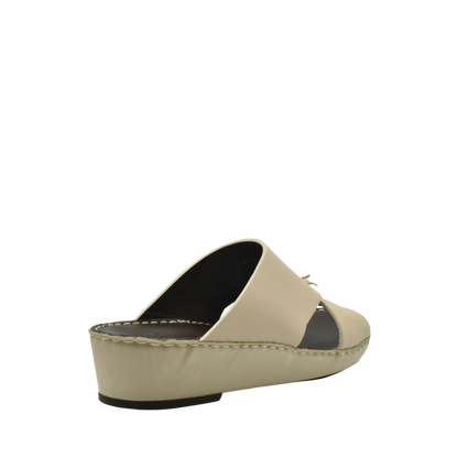 Beige luxury nappa leather sandal with wedge sole and open toe design from Private Collection
