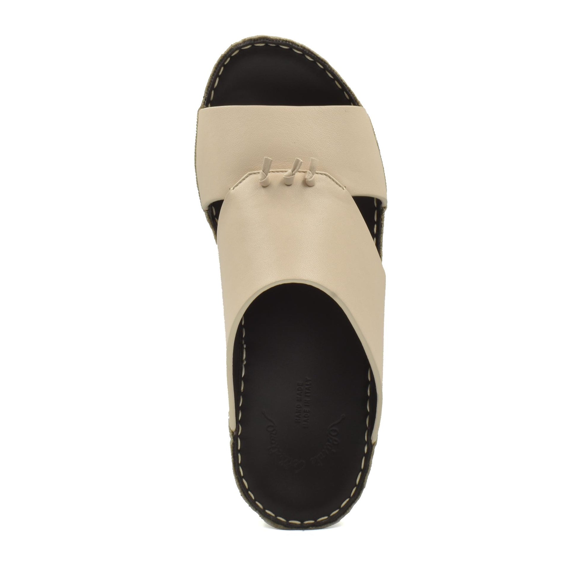 Top view of a beige luxury nappa leather sandal with black sole and contrast stitching