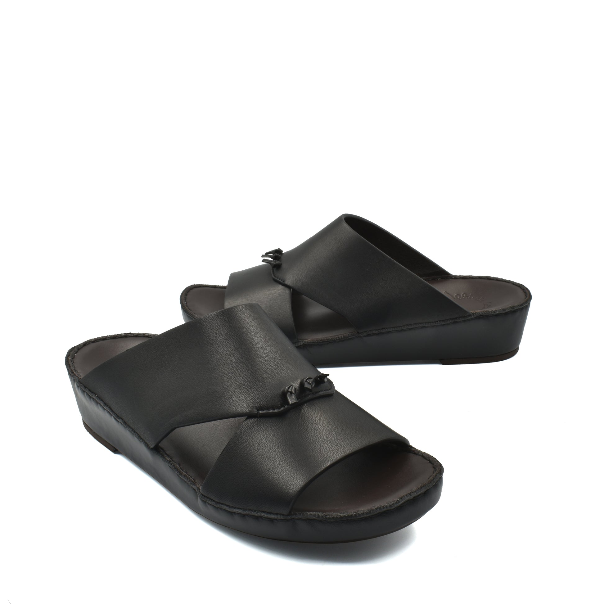 Black luxury nappa leather sandal with wide crossover straps and cushioned sole from Private collection
