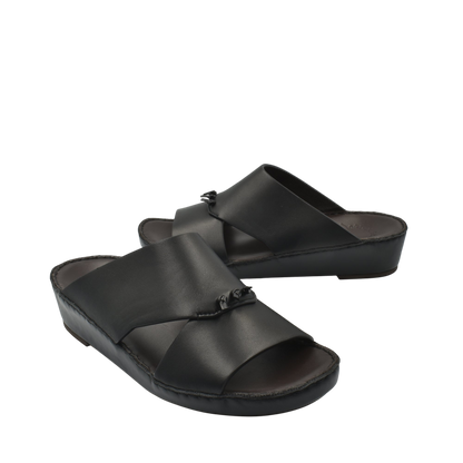 Black luxury nappa leather sandal with wide crossover straps and cushioned sole from Private collection