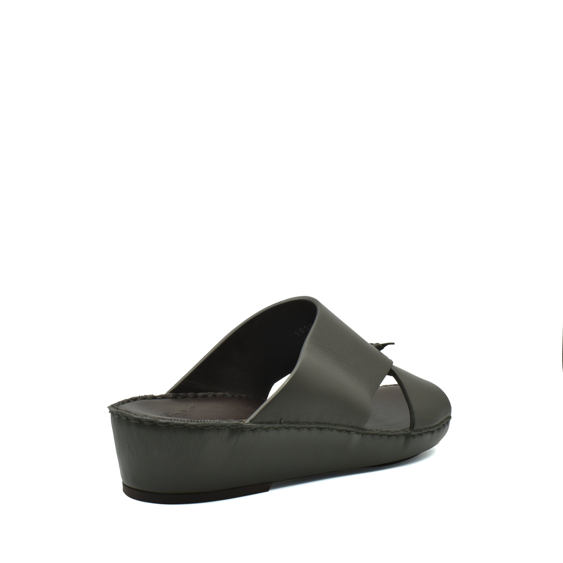 Side view of a gray luxury nappa leather sandal with a wedge sole from Private collection