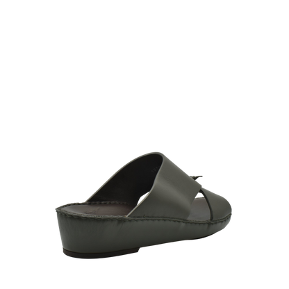 Side view of a gray luxury nappa leather sandal with a wedge sole from Private collection