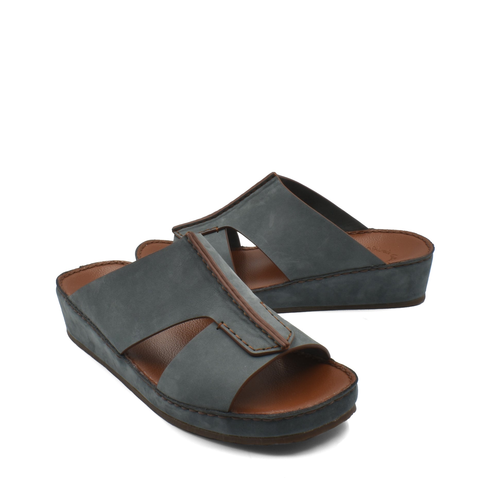 Gray luxury nubuck slides with cushioned brown footbed and open toe design