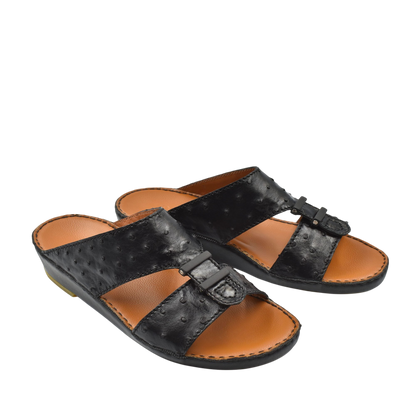 Black luxury ostrich sandals with adjustable buckle and tan insole from private collection