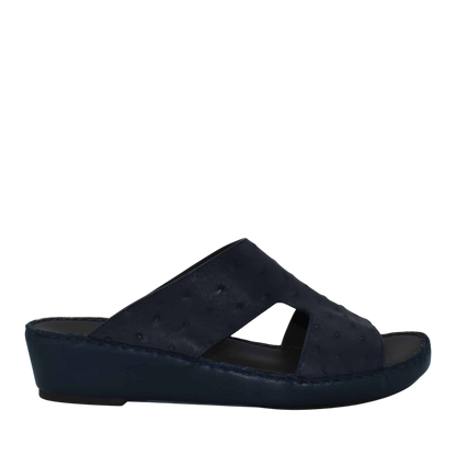 Black luxury ostrich sandals with wedge heel and open toe design from Private Collection