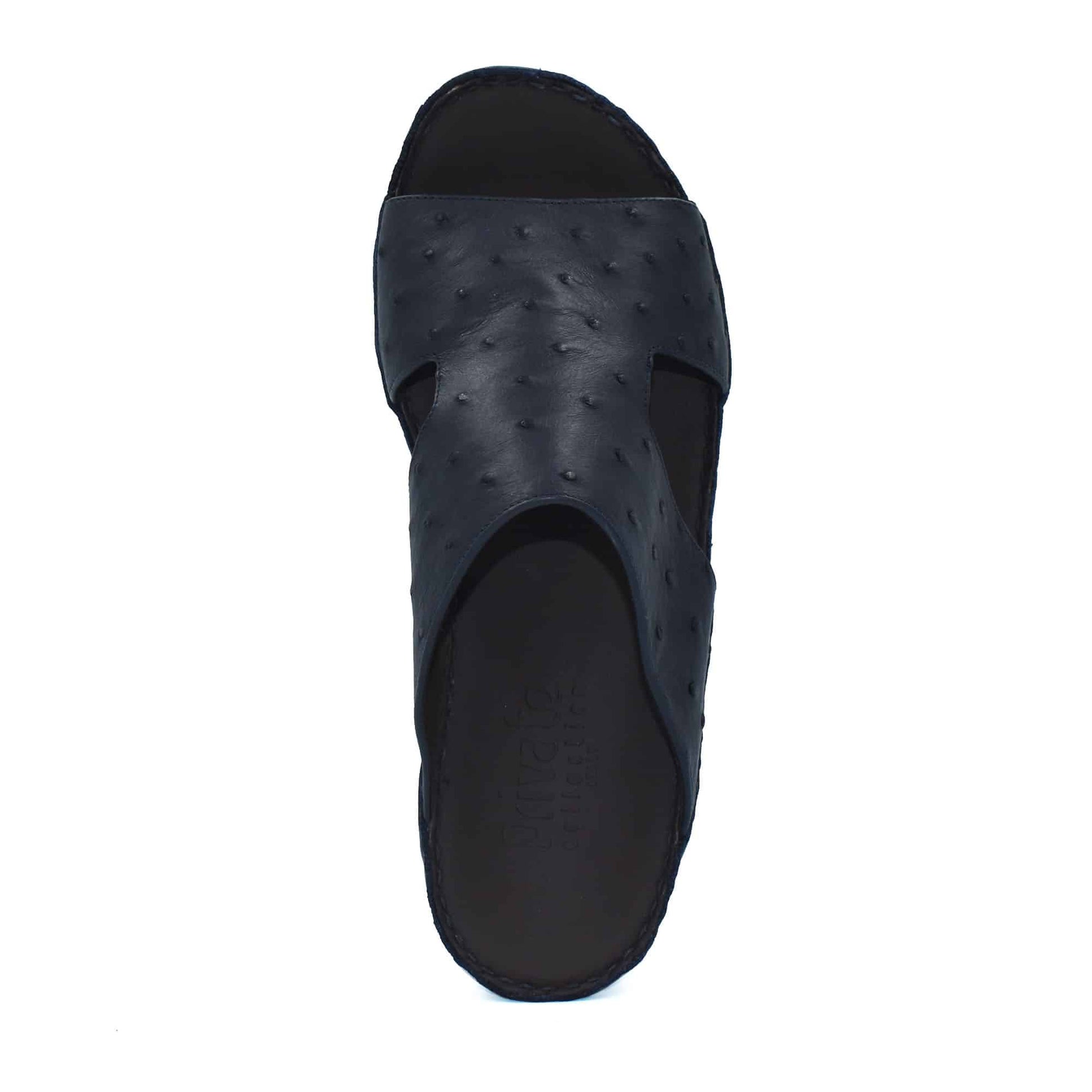 Black luxury ostrich sandals with textured leather upper and open toe design