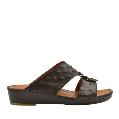 Black luxury ostrich sandals with textured leather and open toe design from Private Collection