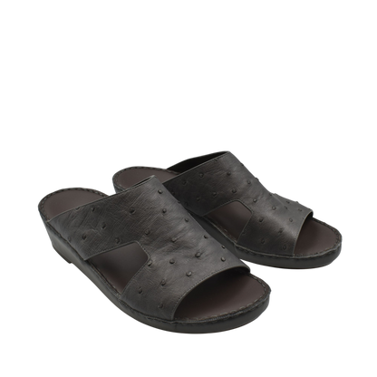 Black luxury ostrich sandals with open toe and textured leather design from private collection