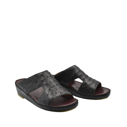 Black luxury ostrich sandals with open toe and textured leather design from Private collection