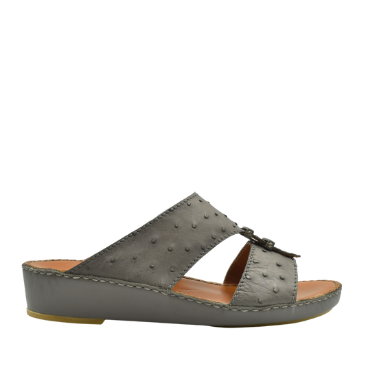 Gray luxury ostrich sandals with wedge heel and textured leather upper from Private Collection