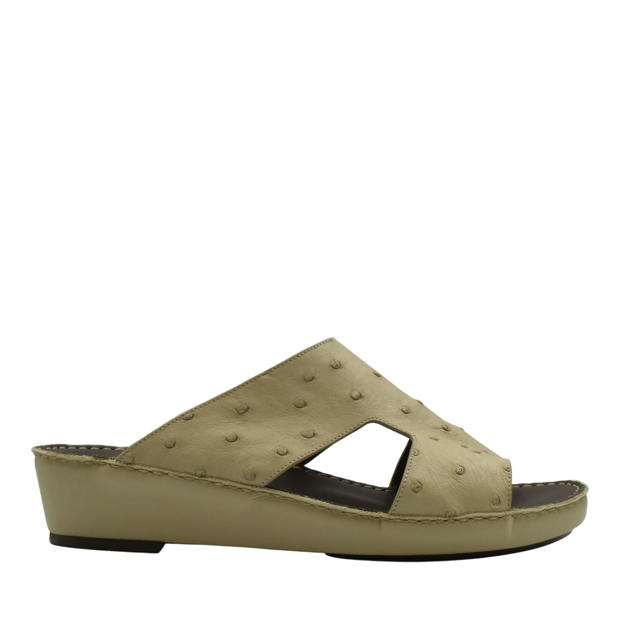Beige luxury ostrich sandals with textured leather upper and wedge sole from private collection