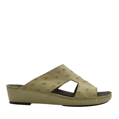 Beige luxury ostrich sandals with textured leather upper and wedge sole from private collection