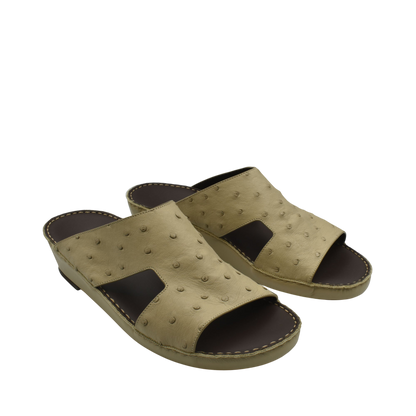 Tan luxury ostrich sandals with open toe and textured leather upper from Private Collection