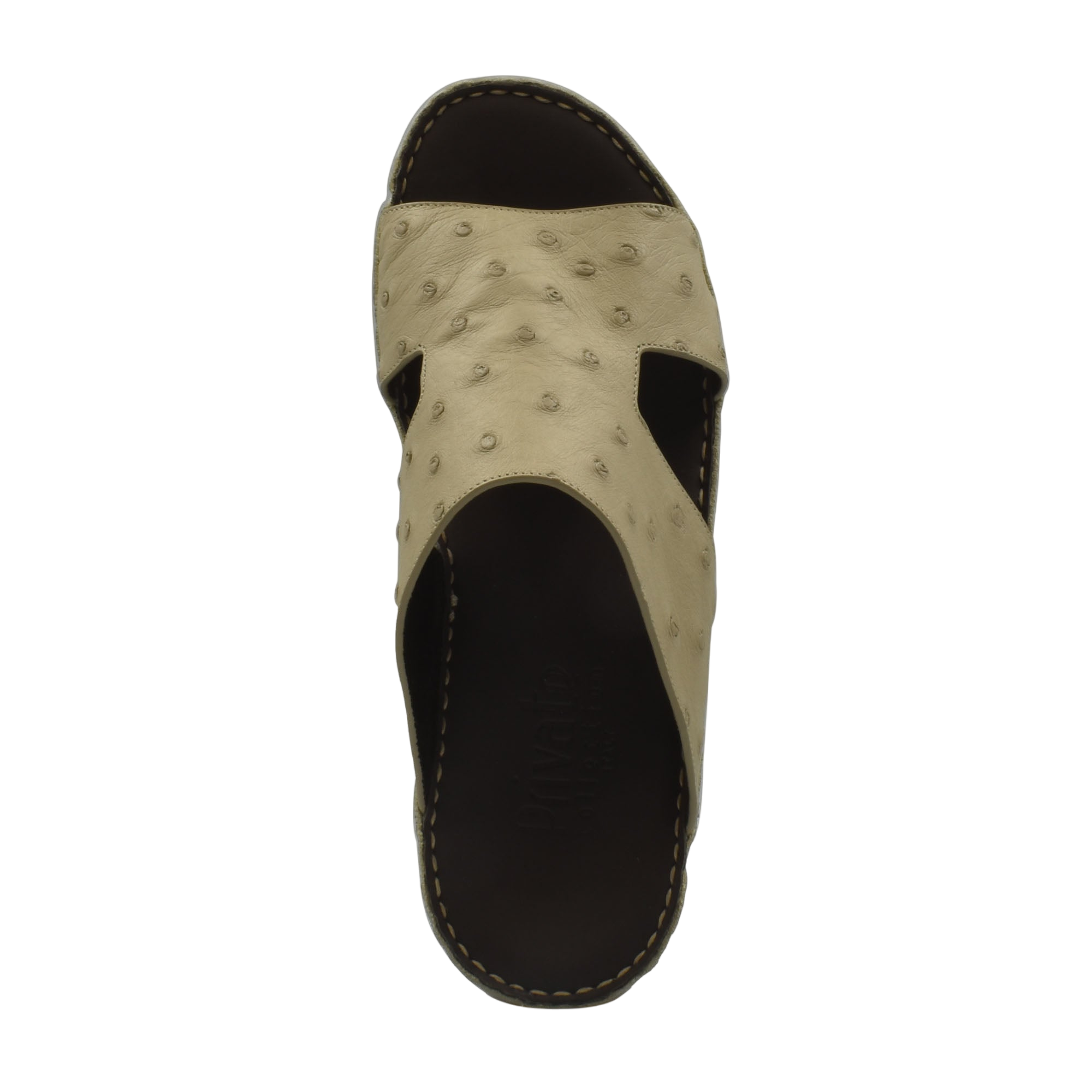 Top view of beige luxury ostrich sandals with textured leather and black sole