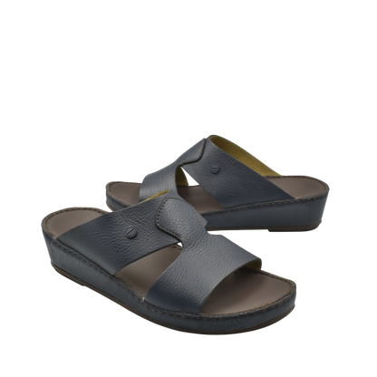 Black leather luxury slip-on footwear with open toe and cushioned sole for comfort