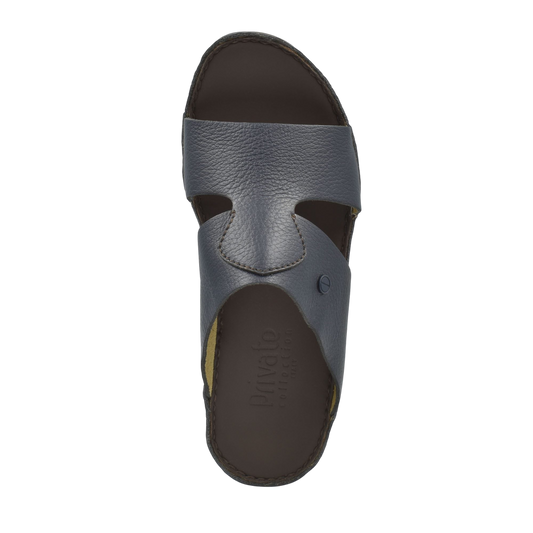Top view of gray luxury slip-on footwear with open toe and textured leather upper