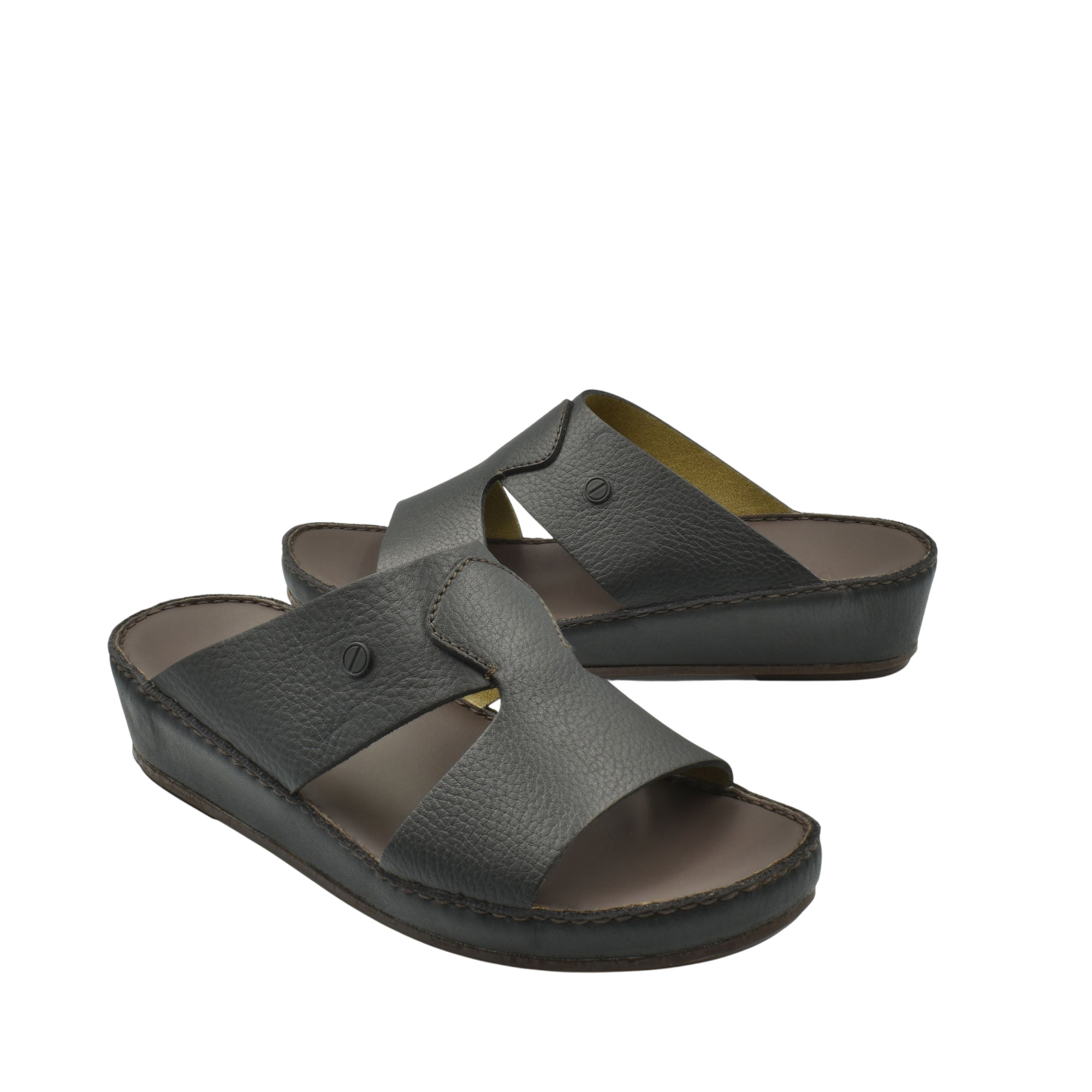 Black leather luxury slip-on footwear with cushioned sole and open toe design