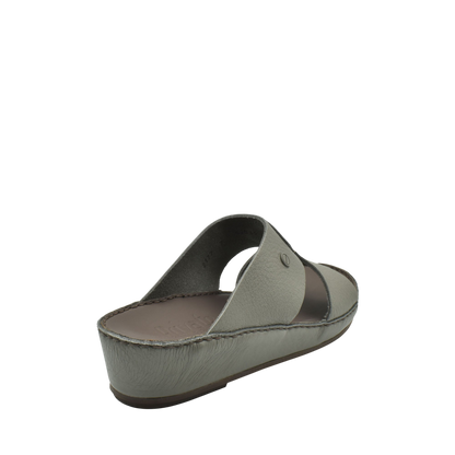 Private collection luxury slip-on footwear in muted gray with open toe and cushioned sole