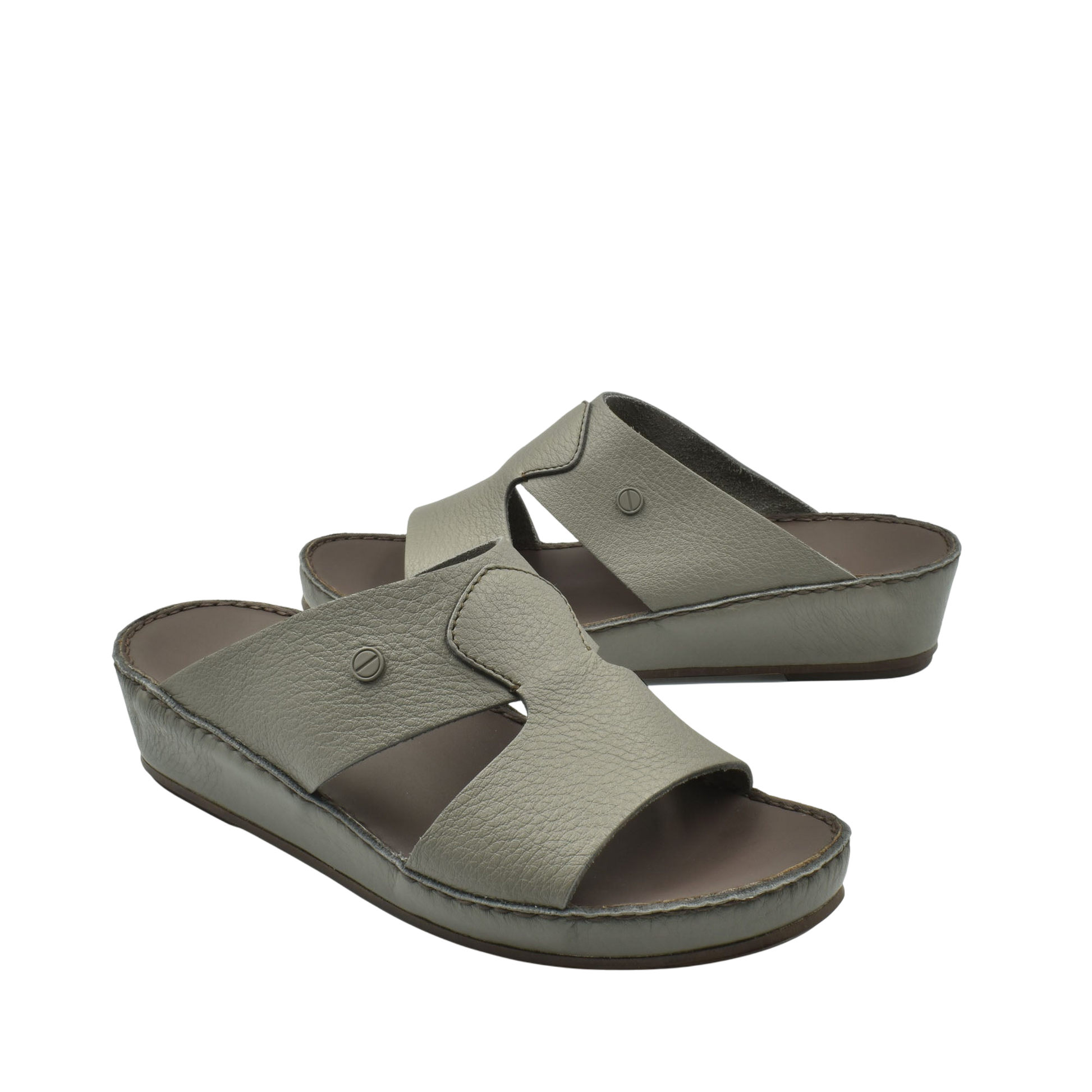 Private collection luxury slip-on footwear in taupe with cushioned sole and open toe design
