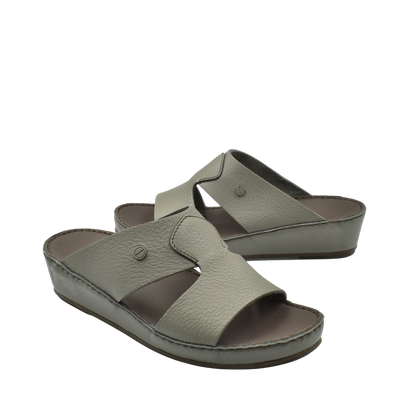 Private collection luxury slip-on footwear in taupe with cushioned sole and open toe design