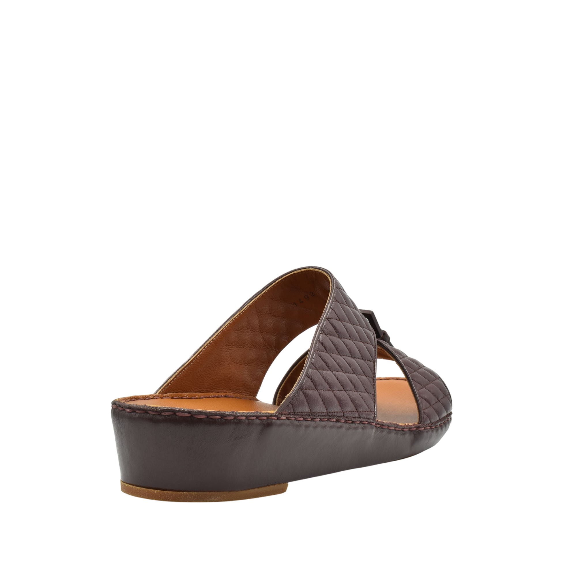 Brown quilted luxury slip-on footwear with low wedge heel and cushioned insole from Private collection