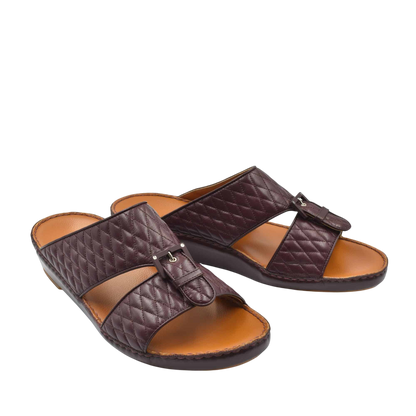 Brown quilted luxury slip-on footwear with open toe and buckle detail from private collection