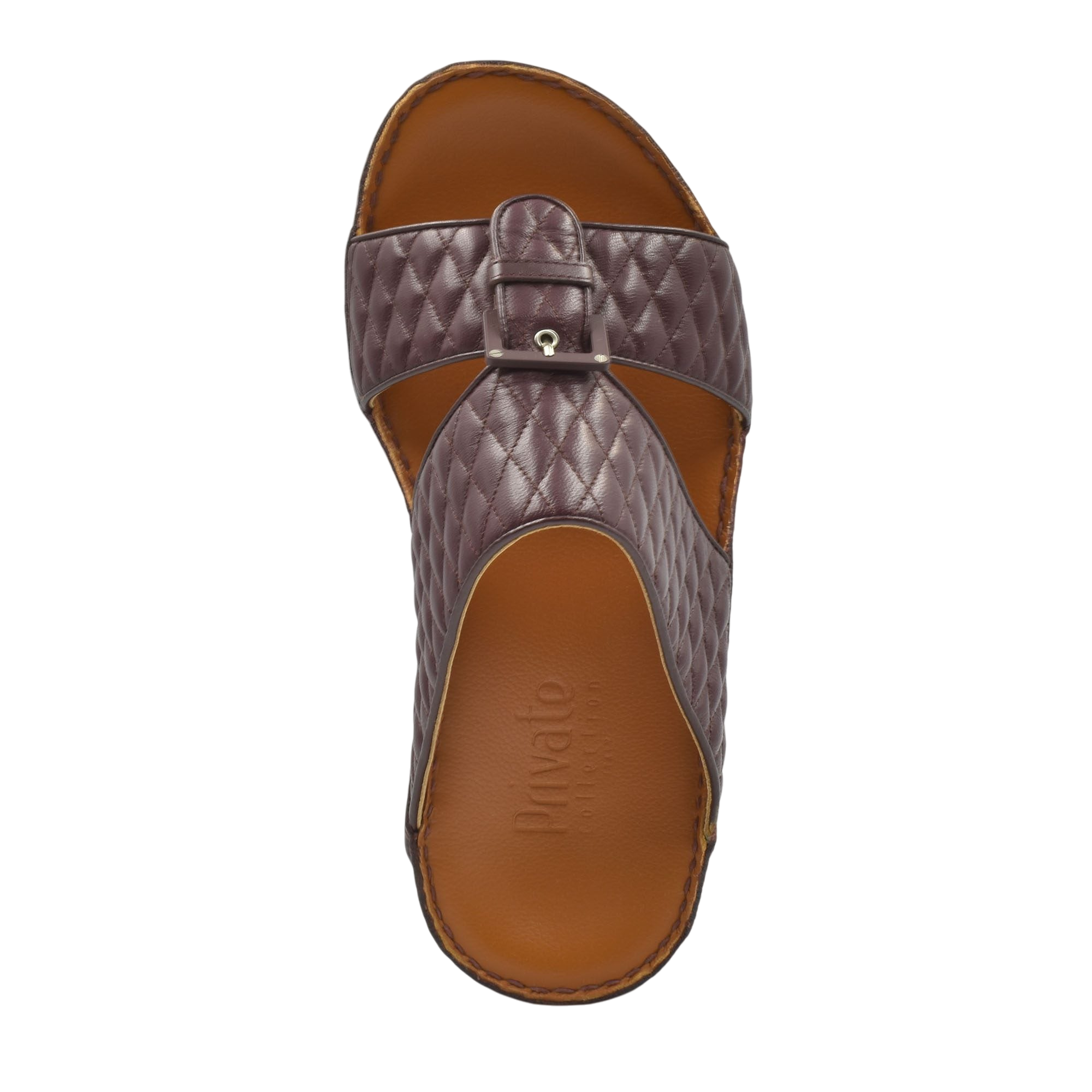 Top view of brown quilted leather luxury slip-on footwear with buckle detail and cushioned sole