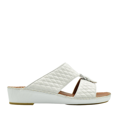 White quilted luxury slip-on footwear with cushioned sole and open toe design