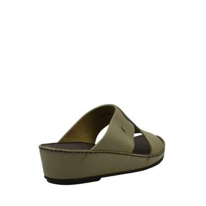 Beige luxury slip-on footwear with cushioned sole and open toe design from private collection