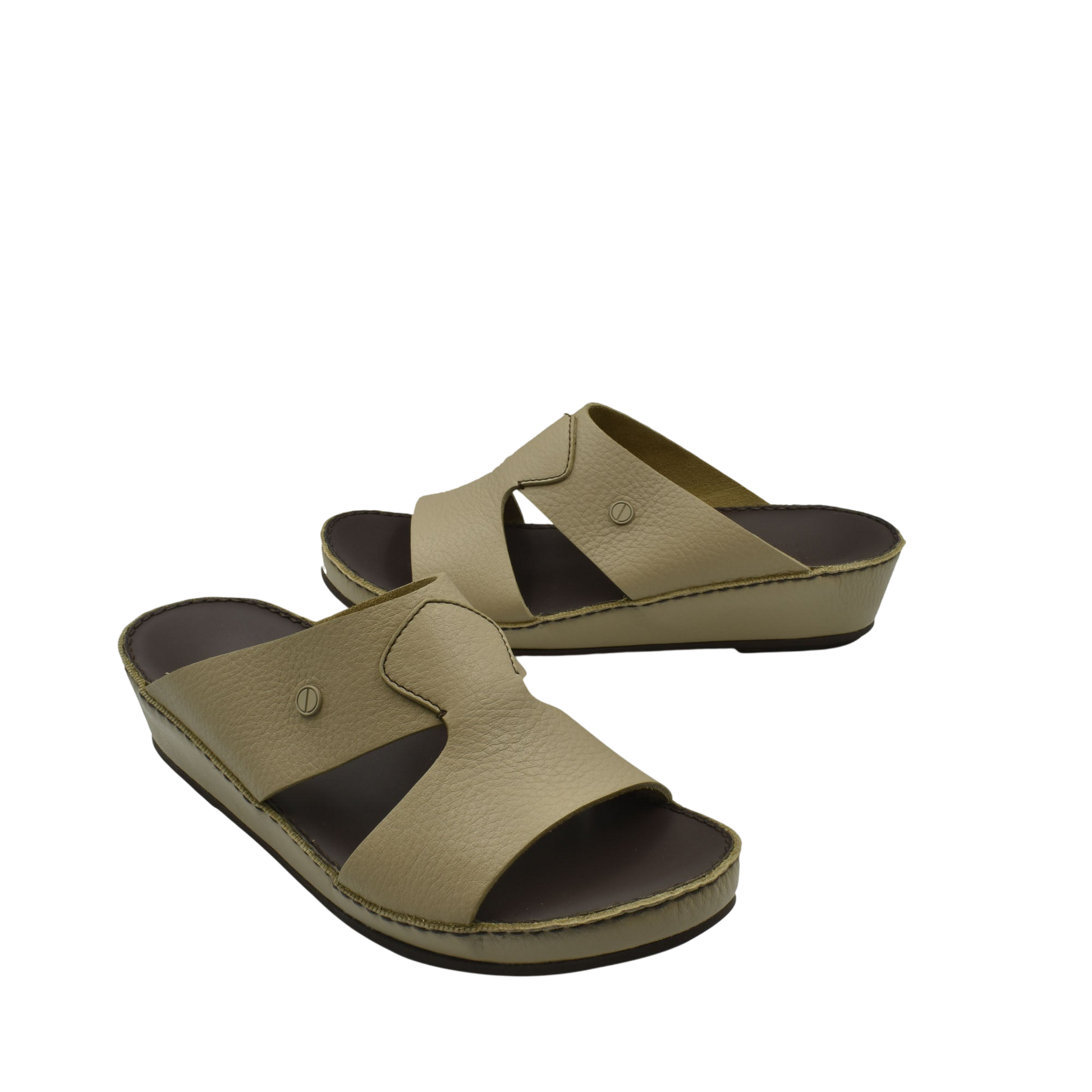 Beige leather luxury slip-on footwear with open toe and cushioned sole for comfortable wear