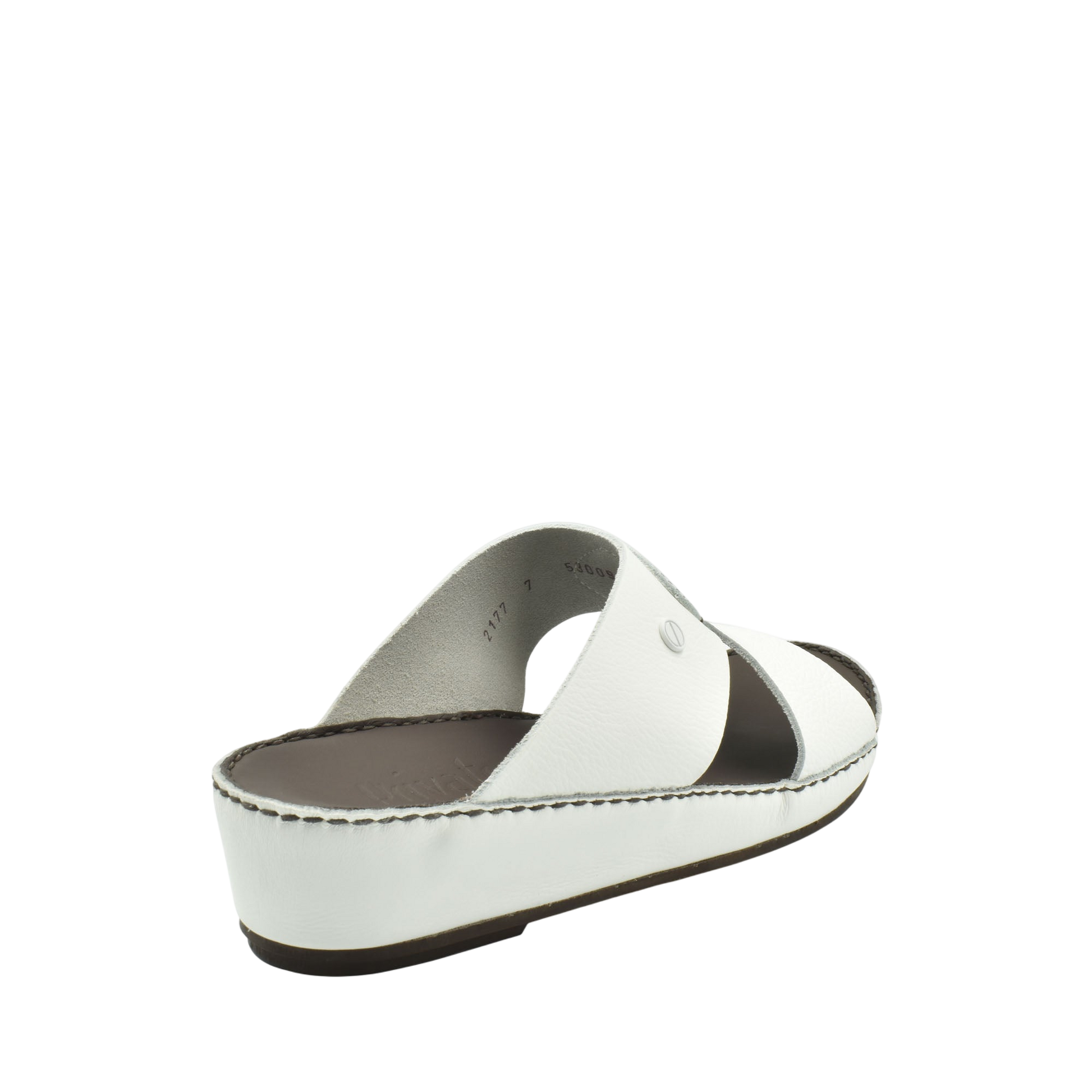 White luxury slip-on footwear with cushioned sole and open-toe design from Private Collection